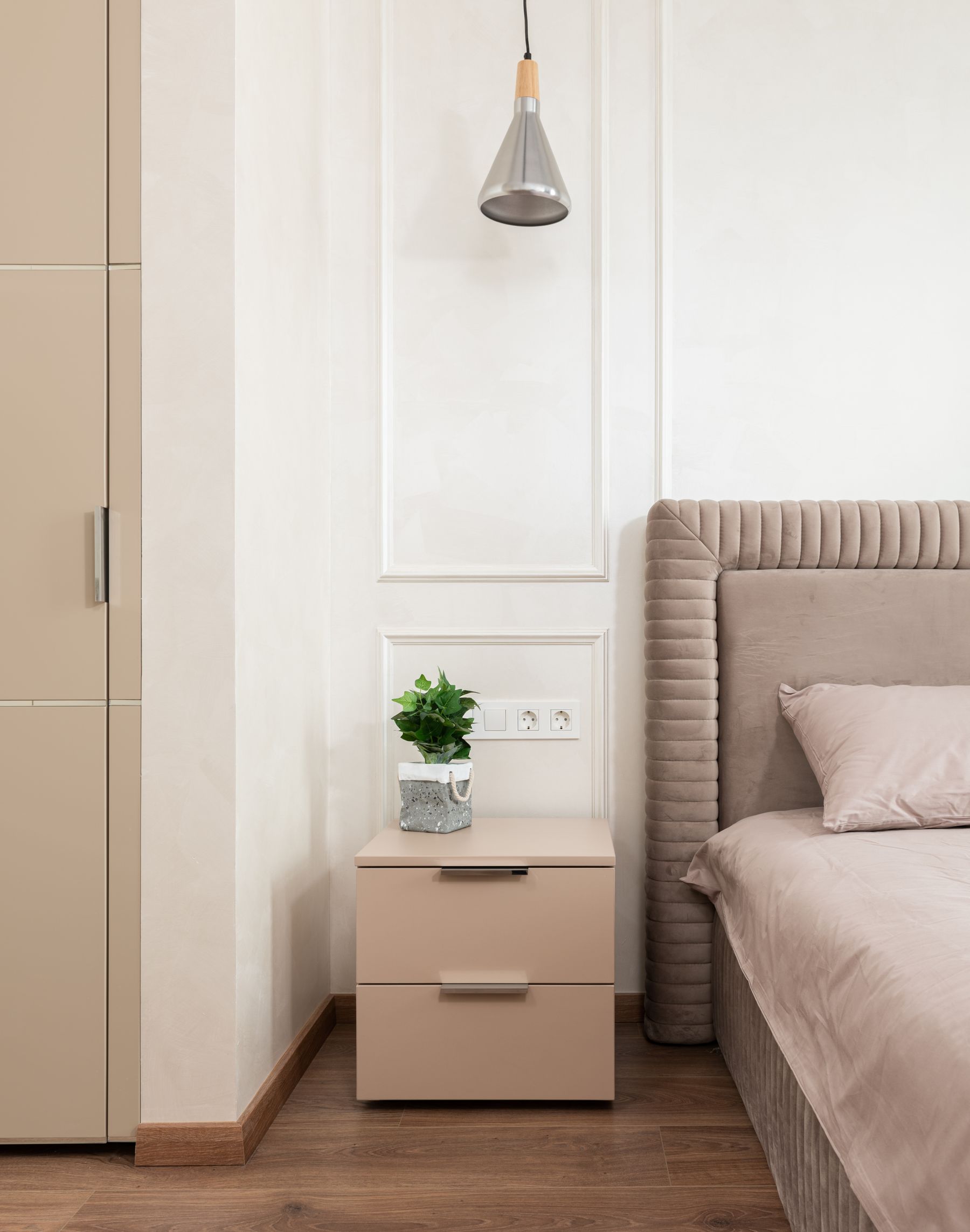 Bedroom reference with layered neutral bedding and wood details